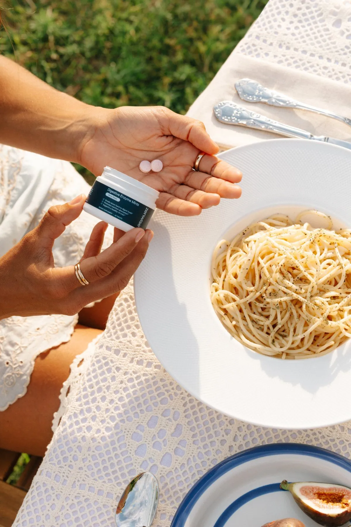 Digestive Enzyme Mints beside pasta